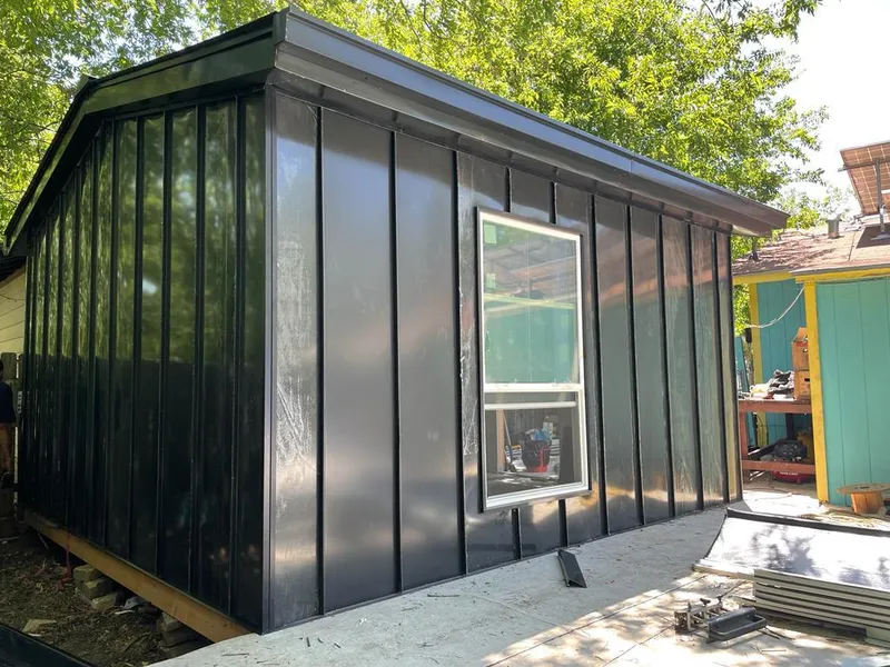 Black standing seam metal wall panels for Roof Inspection in Fox Point